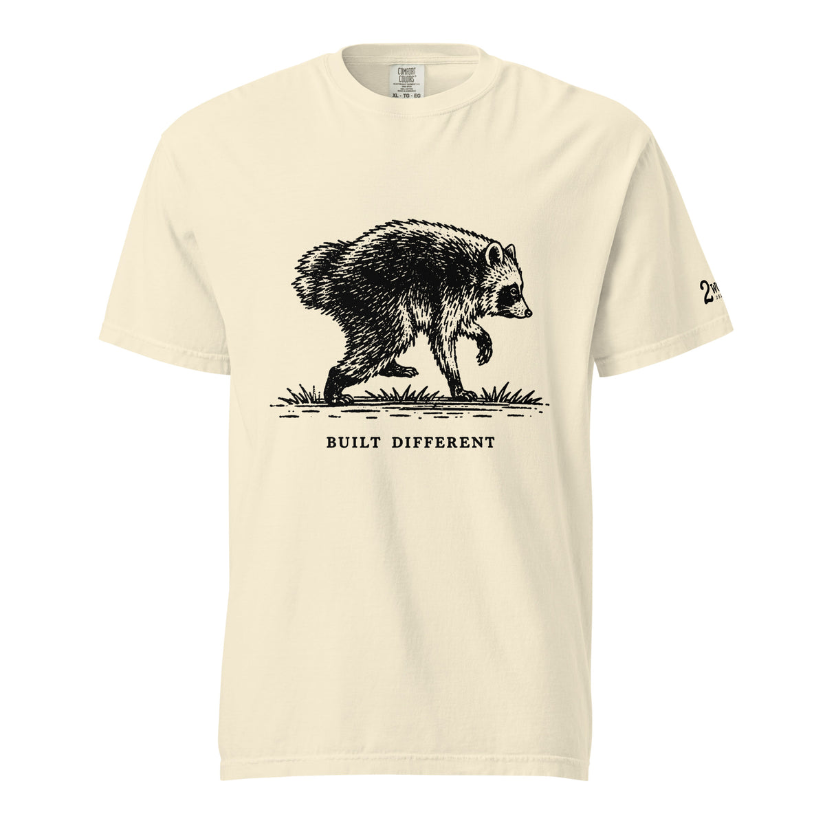 Vintage black-and-white illustration of a raccoon walking above the words "Built Different."