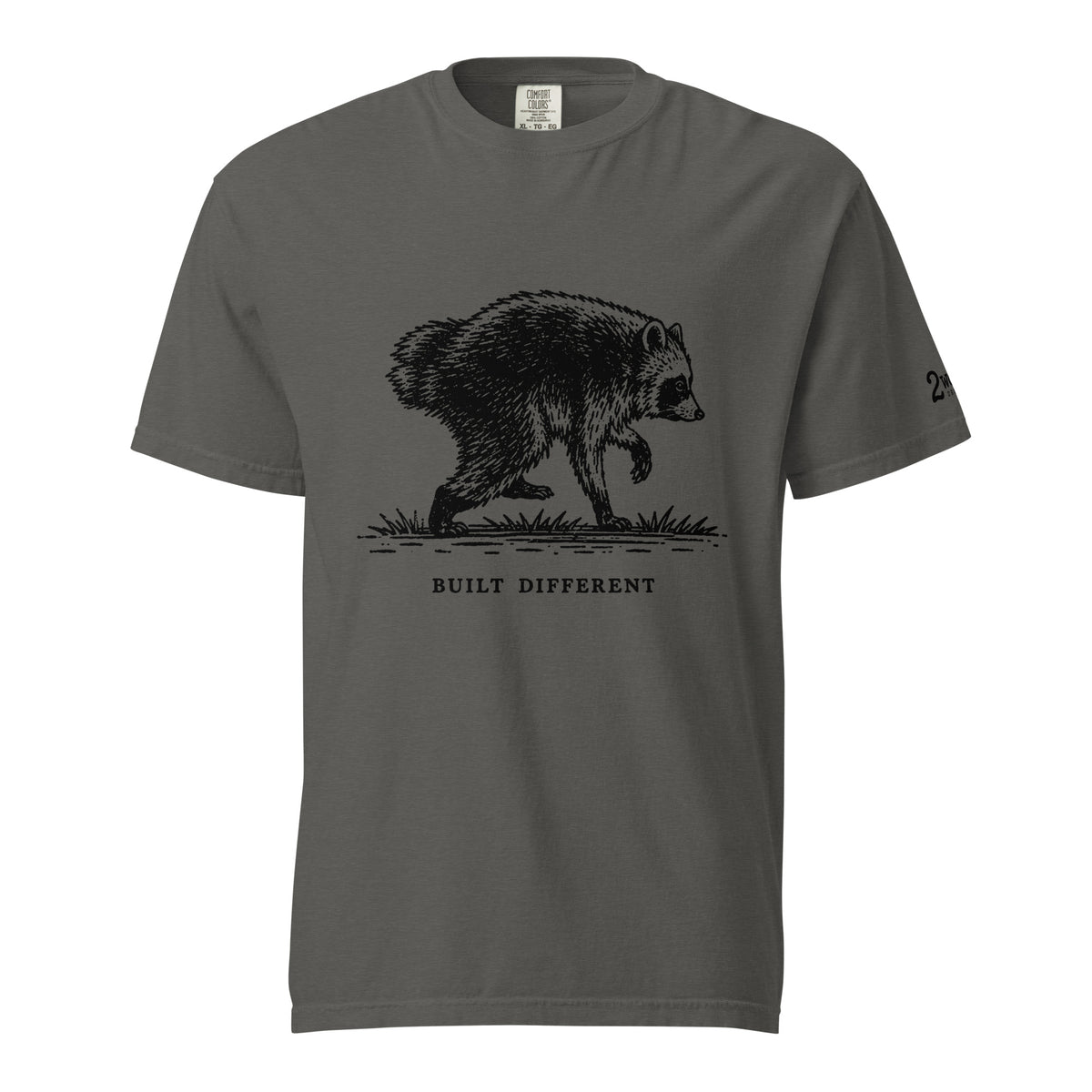 Vintage black-and-white illustration of a raccoon walking above the words "Built Different."
