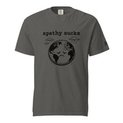 Black ink illustration of Earth with a bandage on its forehead beneath two raining clouds and the words “Apathy Sucks,” shown on a t-shirt.