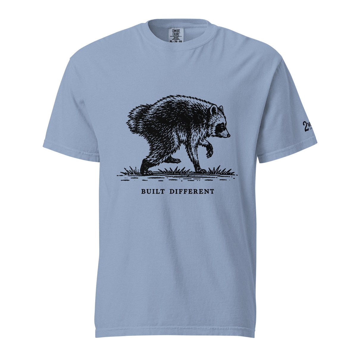 Vintage black-and-white illustration of a raccoon walking above the words "Built Different."