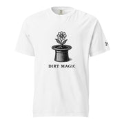 Black vintage-style illustration of a blooming flower growing from a magician's top hat with the words "Dirt Magic" beneath it, rendered in bold botanical line art inspired by classic storybook illustrations on a t-shirt.