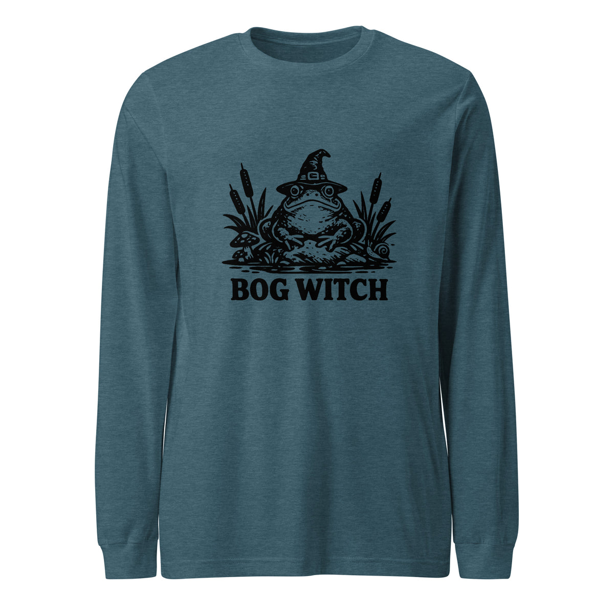 Black ink folk art illustration of a wide-eyed frog beneath an oversized pointed witch hat surrounded by cattails and marsh plants, with the words “BOG WITCH,” on a long sleeve tee.