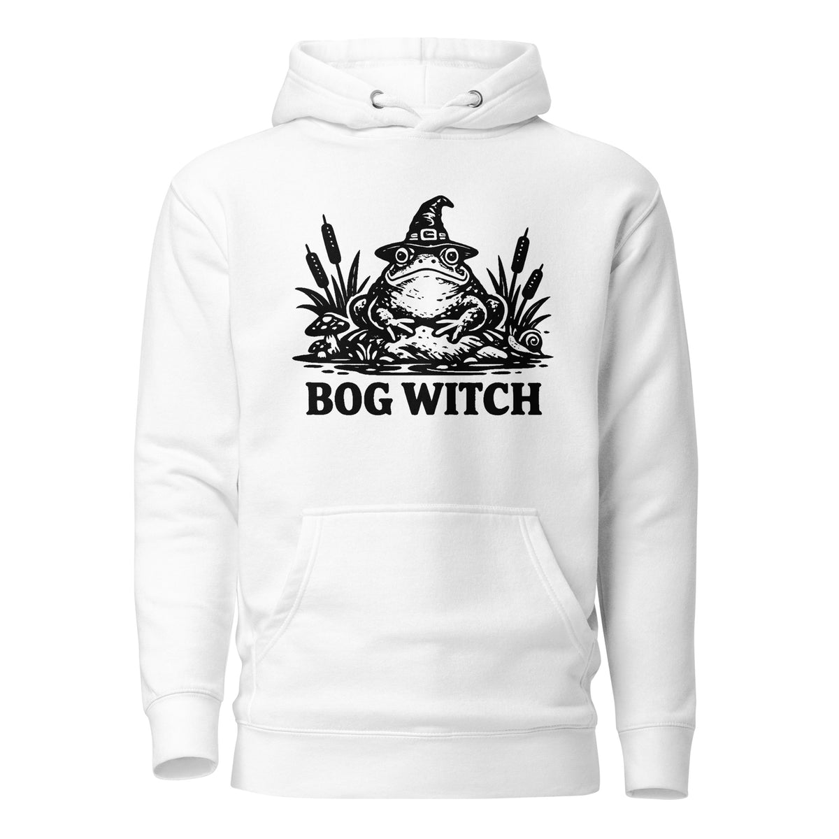 Black ink folk art illustration of a wide-eyed frog beneath an oversized pointed witch hat surrounded by cattails and marsh plants, with the words “BOG WITCH,” on a hoodie.
