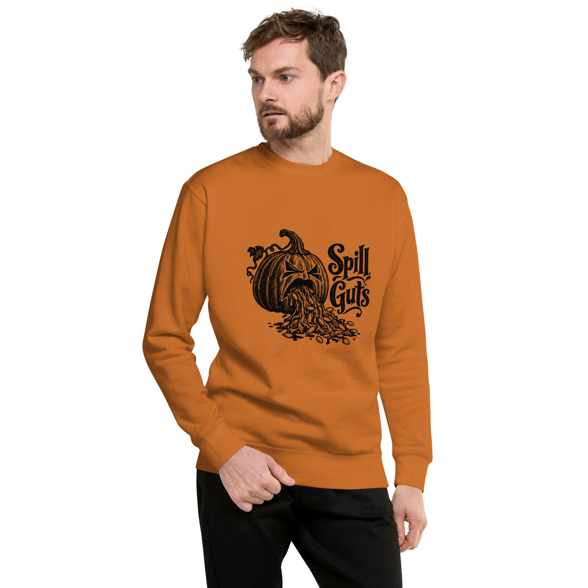 Spill Guts black ink illustration of an expressive carved jack-o'-lantern spilling stringy pumpkin pulp and seeds from its mouth beside decorative hand-lettered text on a sweatshirt.