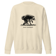Vintage black-and-white illustration of a raccoon walking above the words "Built Different" on a sweatshirt.