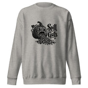 Spill Guts black ink illustration of an expressive carved jack-o'-lantern spilling stringy pumpkin pulp and seeds from its mouth beside decorative hand-lettered text on a sweatshirt.