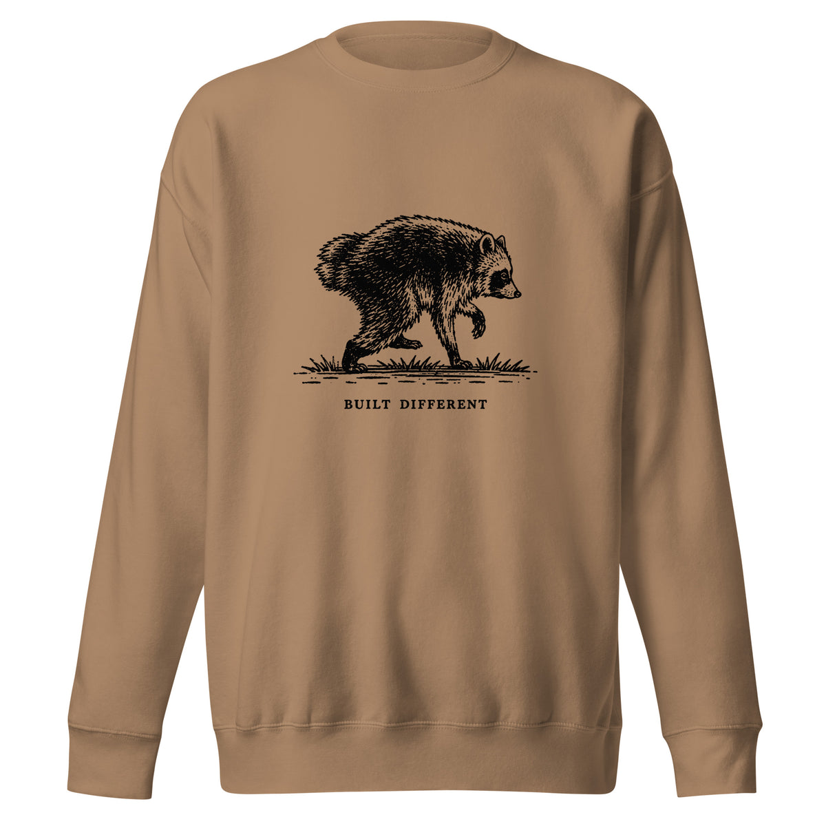 Vintage black-and-white illustration of a raccoon walking above the words "Built Different" on a sweatshirt.