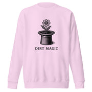 Black vintage-style illustration of a blooming flower growing from a magician's top hat with the words "Dirt Magic" beneath it, rendered in bold botanical line art inspired by classic storybook illustrations on a sweatshirt.